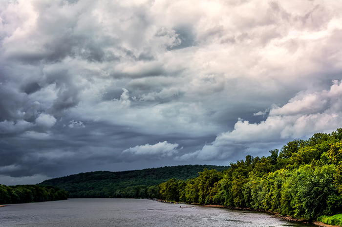 Stormy sky over the Delaware River by Frank King.